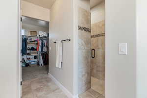 Bathroom with a shower with shower door