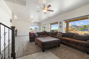 Tiled living room with ceiling fan