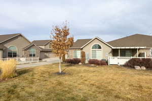 View of front of house with a front lawn