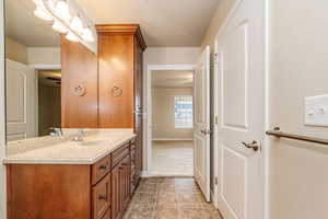 Bathroom featuring vanity and tile patterned floors