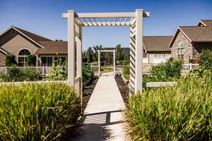 View of property's community with a pergola