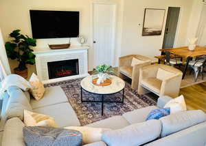 Living room featuring hardwood / wood-style floors