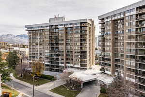 View of building exterior featuring a mountain view