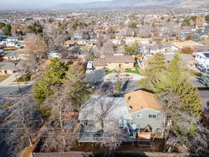 Birds eye view of property with a mountain view