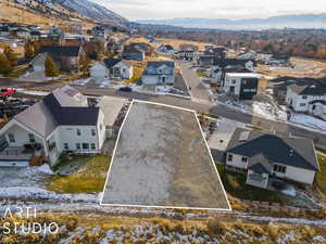 Birds eye view of property with a mountain view