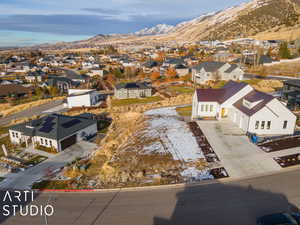 Birds eye view of property featuring a mountain view