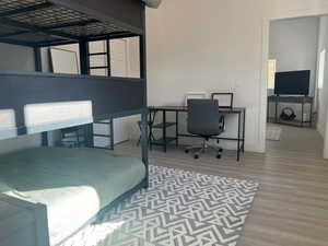 Bedroom featuring light hardwood / wood-style floors