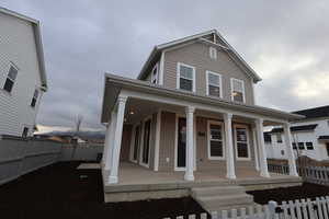 View of front of house featuring covered porch