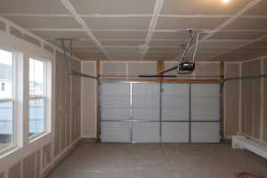 2 car garage with a garage door opener