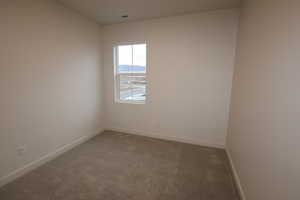 Guest bedroom with a mountain view