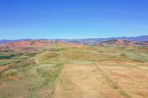 Property view of mountains featuring a rural view