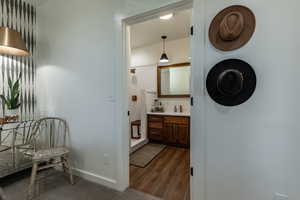 Interior space featuring hardwood / wood-style floors and vanity