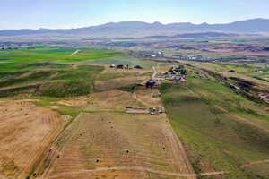 Drone / aerial view with a mountain view and a rural view