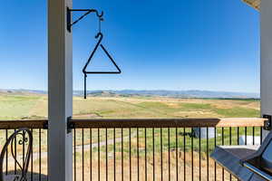 Wooden terrace with a mountain view and a rural view