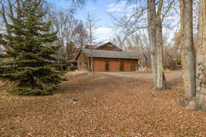 View of home's exterior featuring a garage