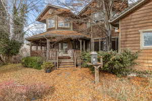 View of front of property featuring a porch