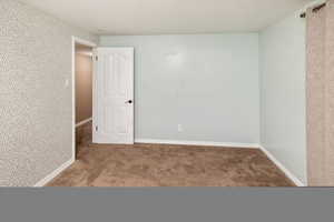 View of carpeted empty room