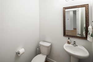 Bathroom with sink and toilet