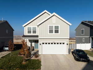 View of property featuring a garage