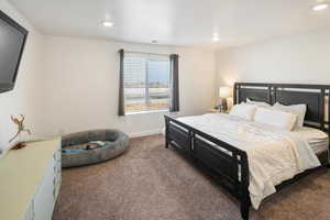 Bedroom with carpet flooring