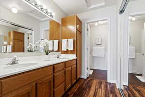 Bathroom featuring vanity and hardwood / wood-style flooring