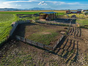 Drone / aerial view with a mountain view and a rural view