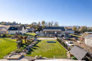 Birds eye view of property with a mountain view