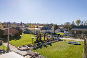 Exterior space featuring a lawn