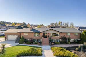 Bi-level home with a front yard