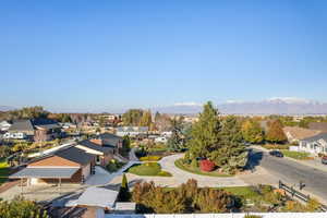 Birds eye view of property featuring a mountain view