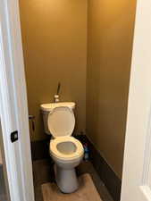 Bathroom with tile patterned floors and toilet