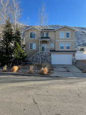 View of front of property featuring a garage