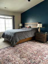 Bedroom featuring carpet floors