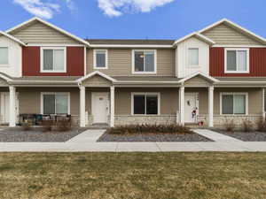 Craftsman house with a front yard