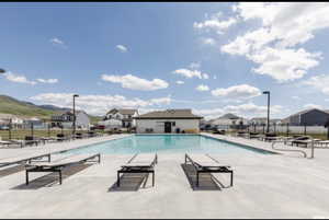 View of pool with a patio area