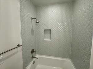 Bathroom featuring tub / shower combination