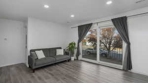 Living room featuring access to balcony