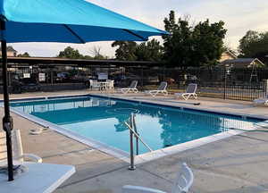 View of fenced in swimming pool