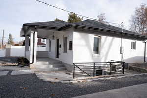 View of front facade featuring covered porch