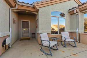 Property entrance featuring a patio