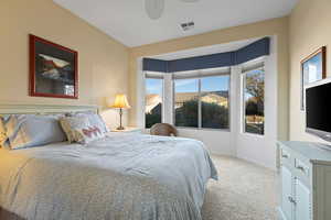 Beuatiful bay windows in this bedroom