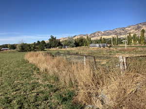 Property view of mountains featuring a rural view