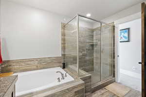 Soaker tub and large shower primary bathroom