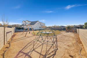 View of yard featuring a playground