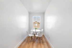 Dining room featuring light wood-type flooring