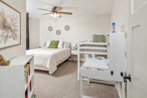 Bedroom featuring carpet flooring and ceiling fan