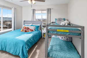 Bedroom featuring carpet flooring and ceiling fan