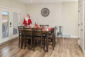 Dining area featuring hardwood / wood-style flooring