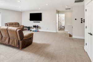 Living room with light colored carpet