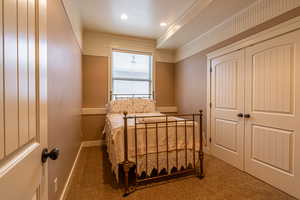 View of carpeted bedroom